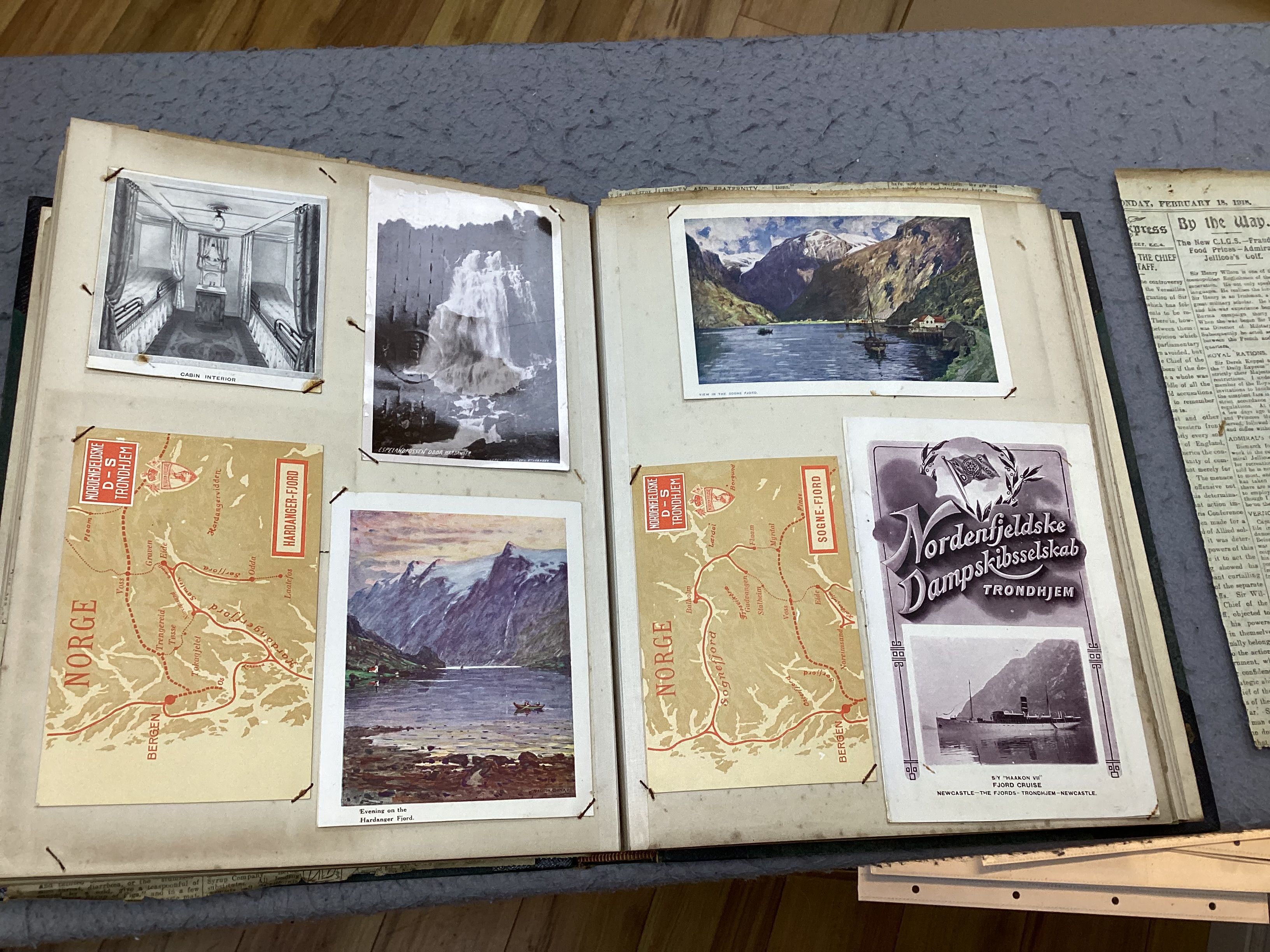 An Ocean liner scrap book and a collection of loose leaves of boating and shipping related postcards